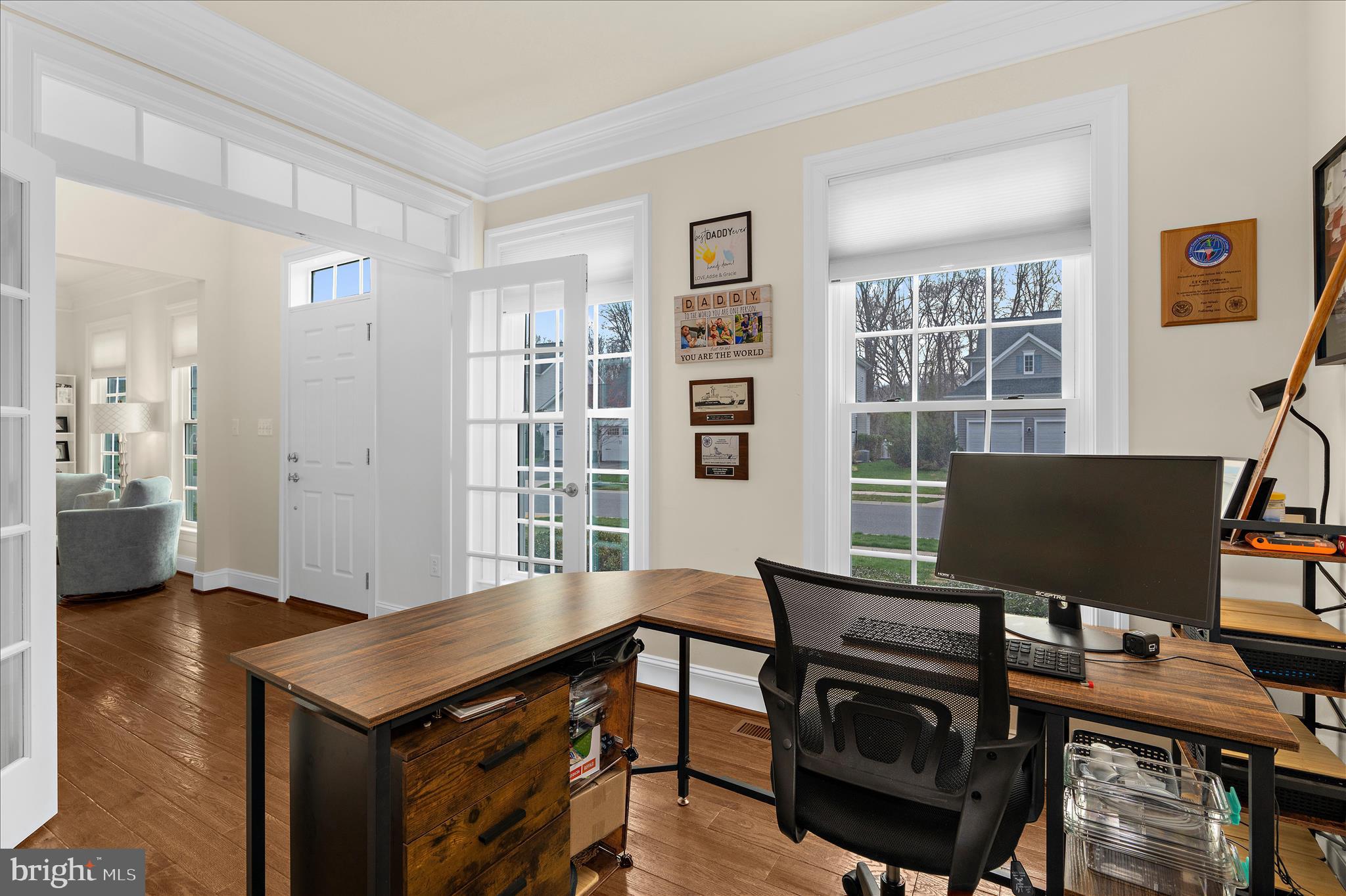 830 Sebastian Lane Gambrills, MD 21054 - Photo 21 of 63 a view of a workspace with furniture and a potted plant