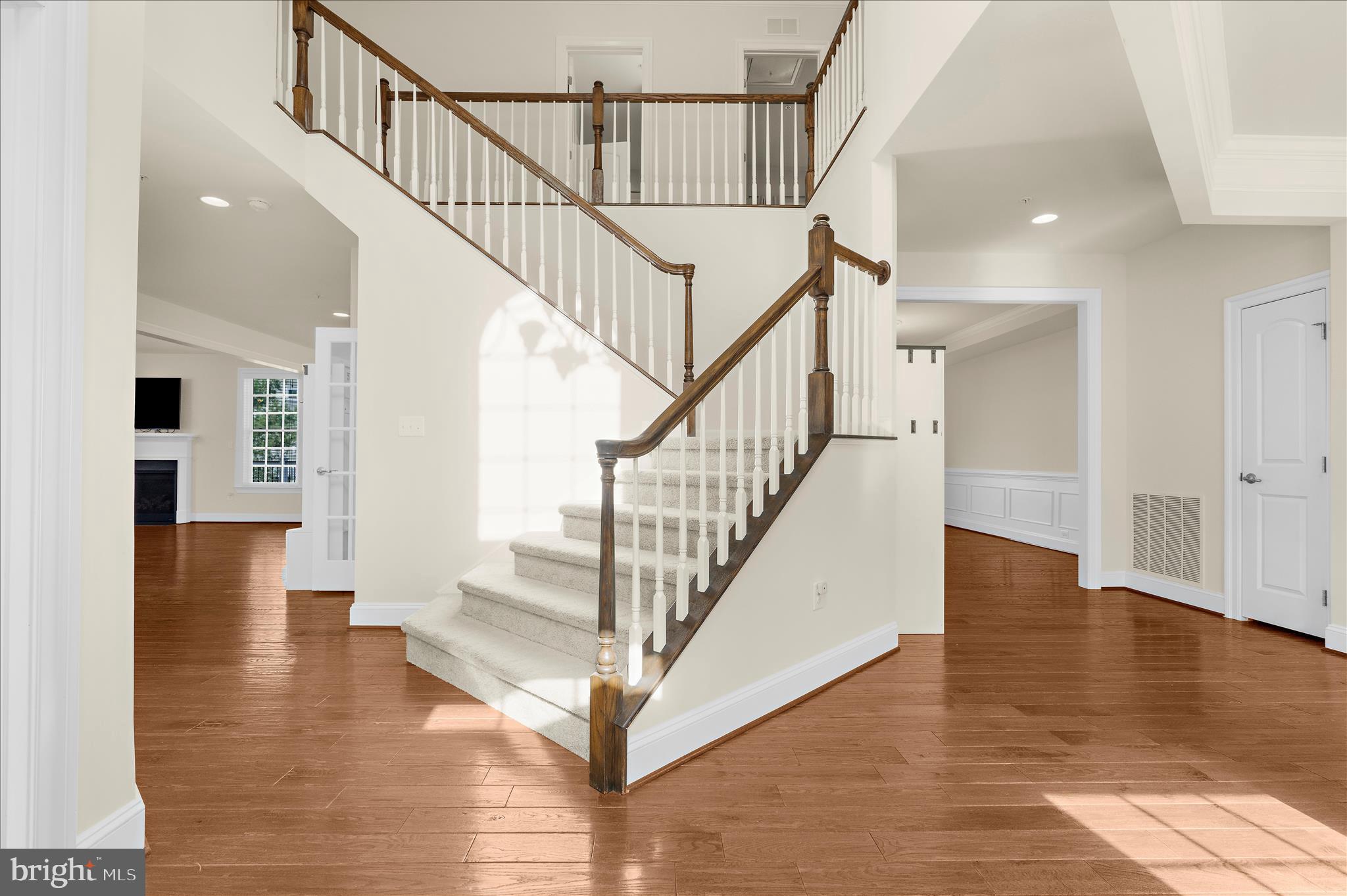 830 Sebastian Lane Gambrills, MD 21054 - Photo 24 of 63 a view of entryway and hall with wooden floor