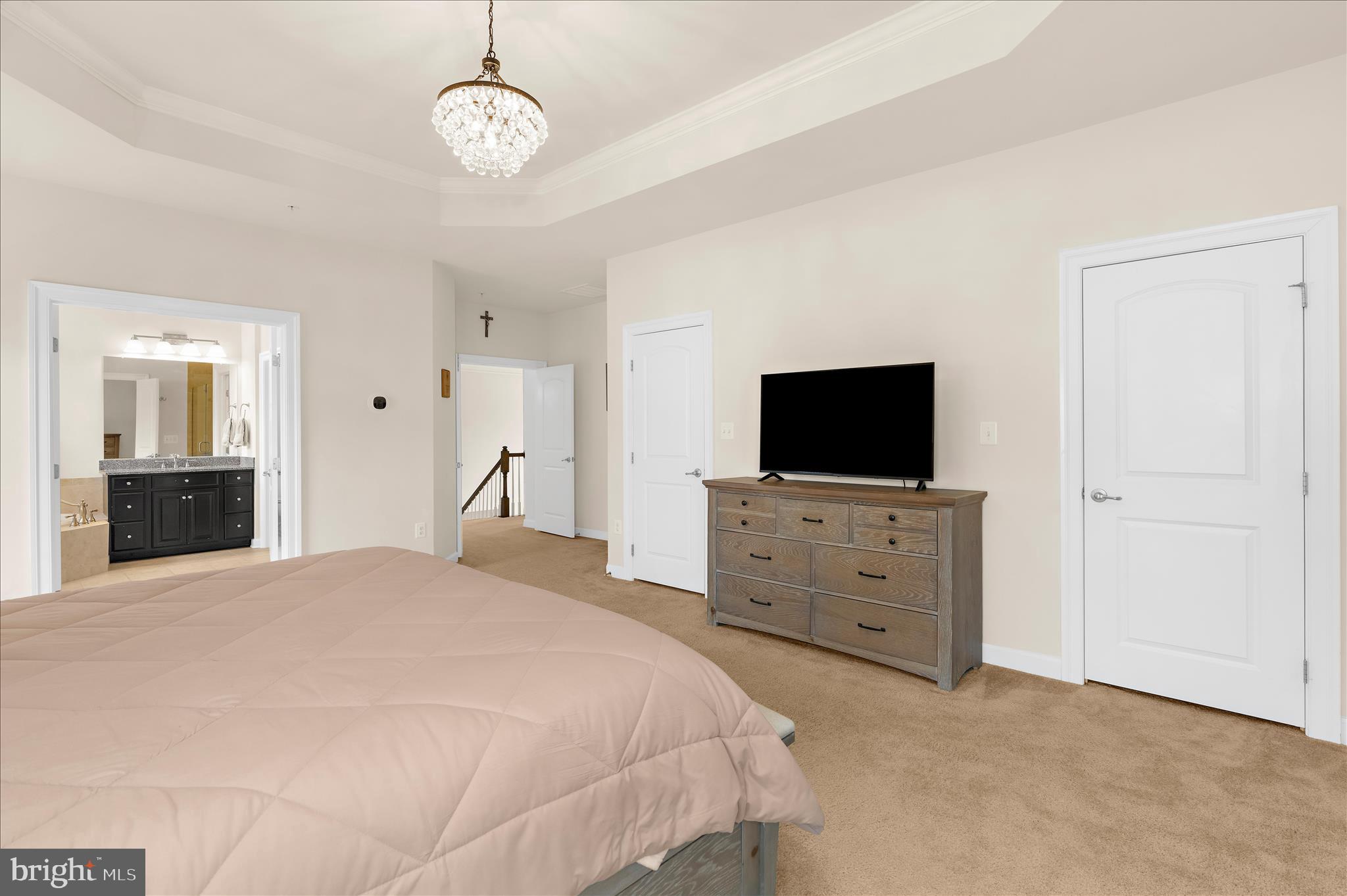 830 Sebastian Lane Gambrills, MD 21054 - Photo 28 of 63 a bedroom with a bed and a flat screen tv