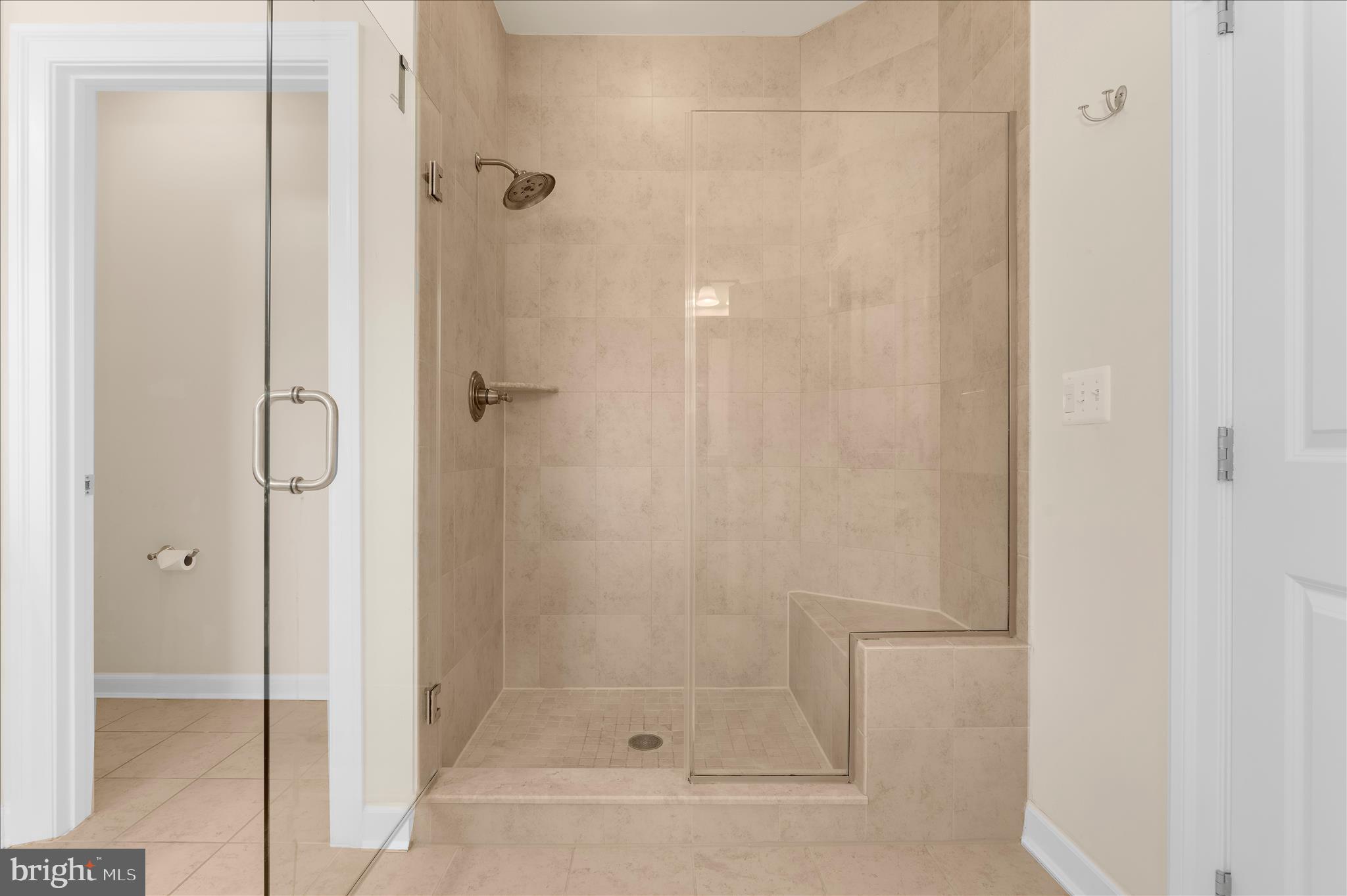 830 Sebastian Lane Gambrills, MD 21054 - Photo 30 of 63 a bathroom with a glass shower door