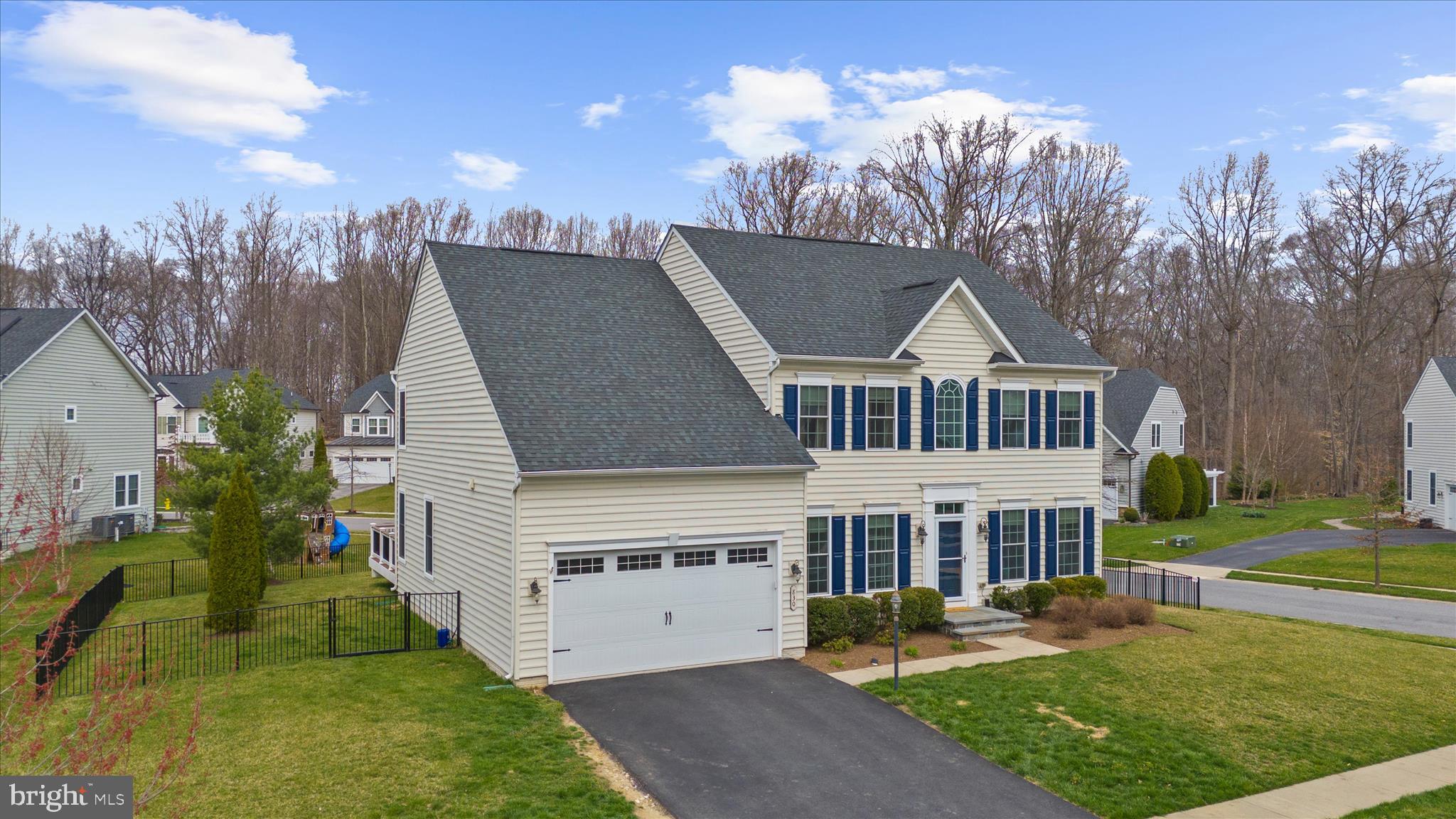 830 Sebastian Lane Gambrills, MD 21054 - Photo 3 of 63 a view of a house with a yard