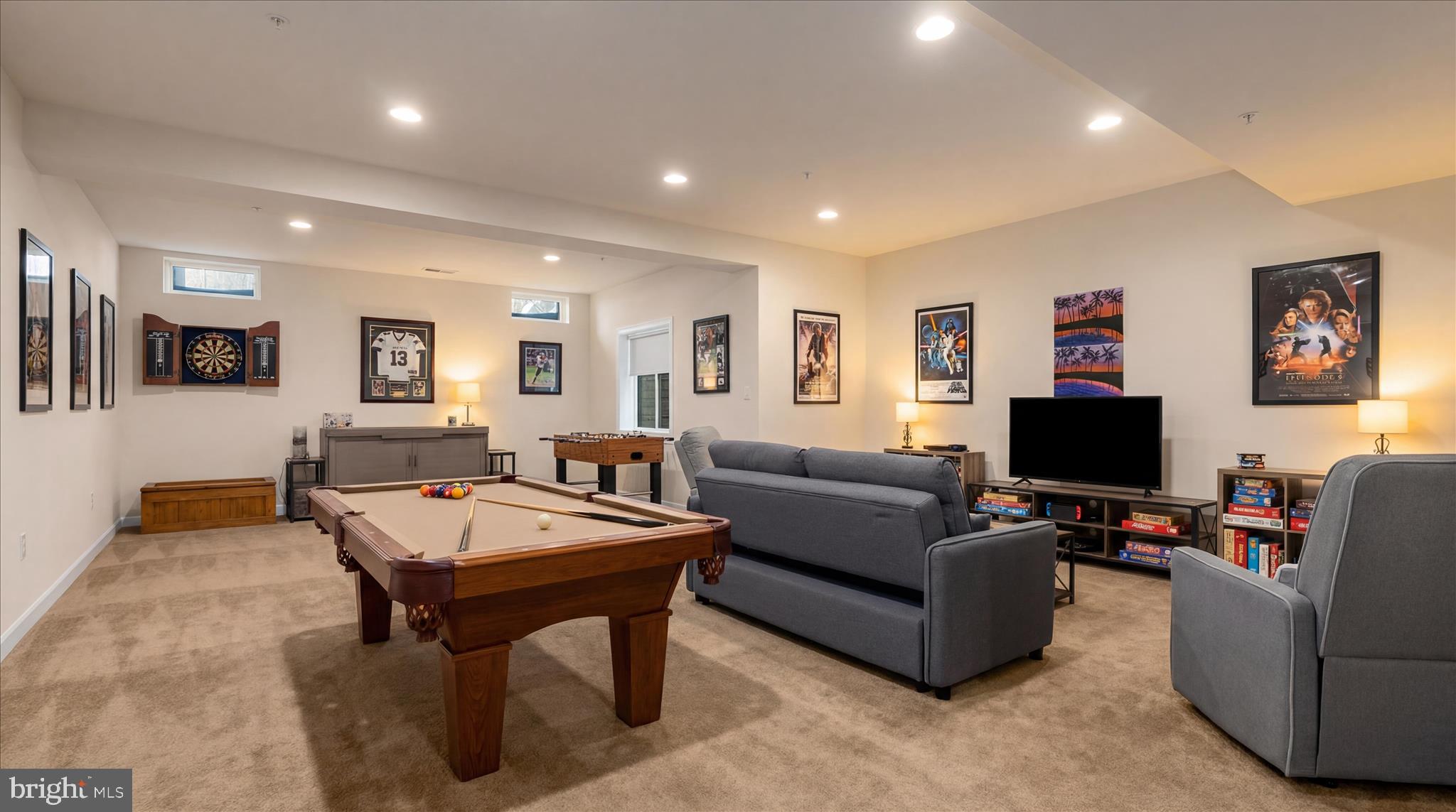 830 Sebastian Lane Gambrills, MD 21054 - Photo 42 of 63 a living room with furniture and a flat screen tv