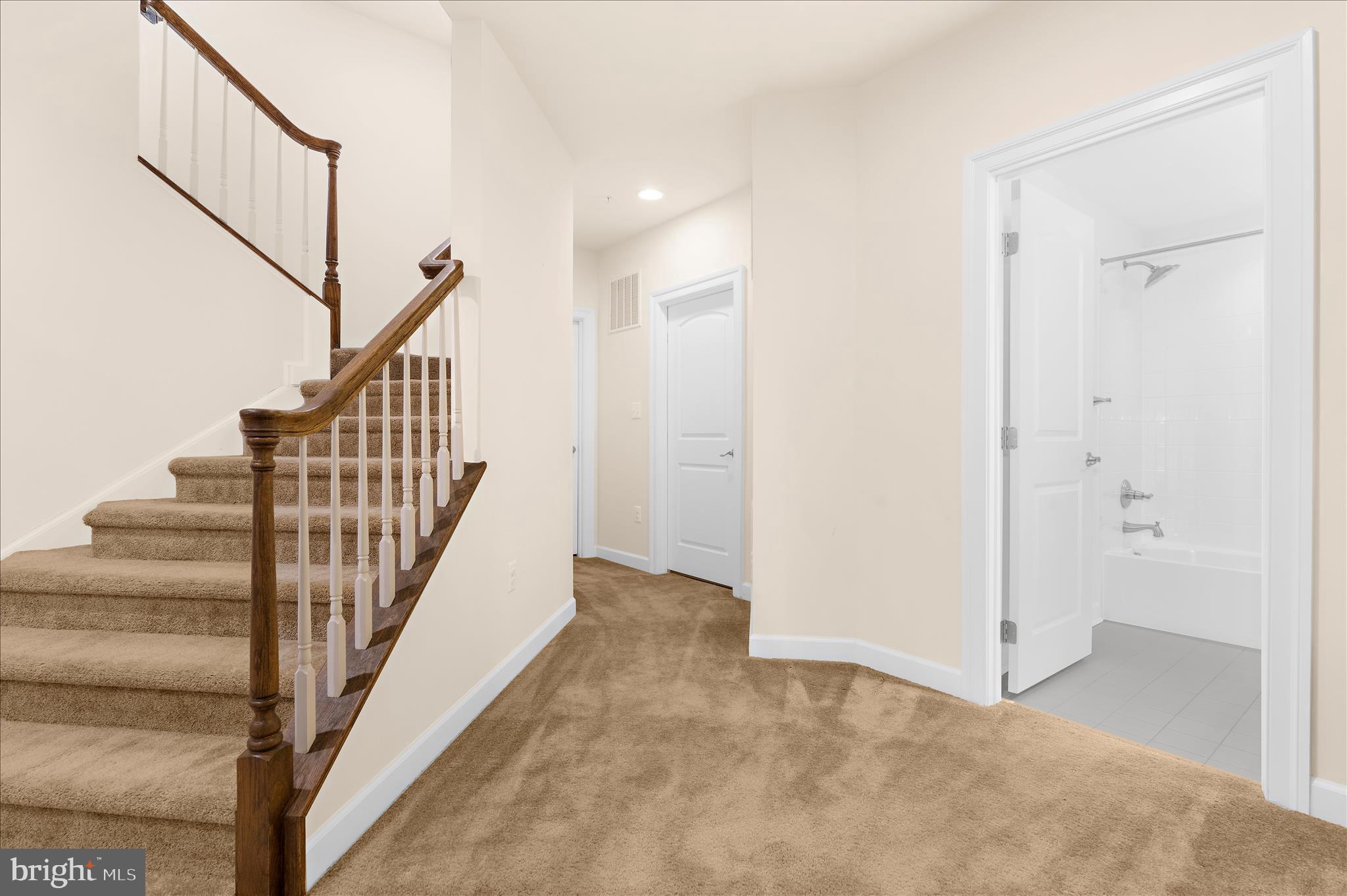 830 Sebastian Lane Gambrills, MD 21054 - Photo 47 of 63 a view of entryway with wooden floor and stairs