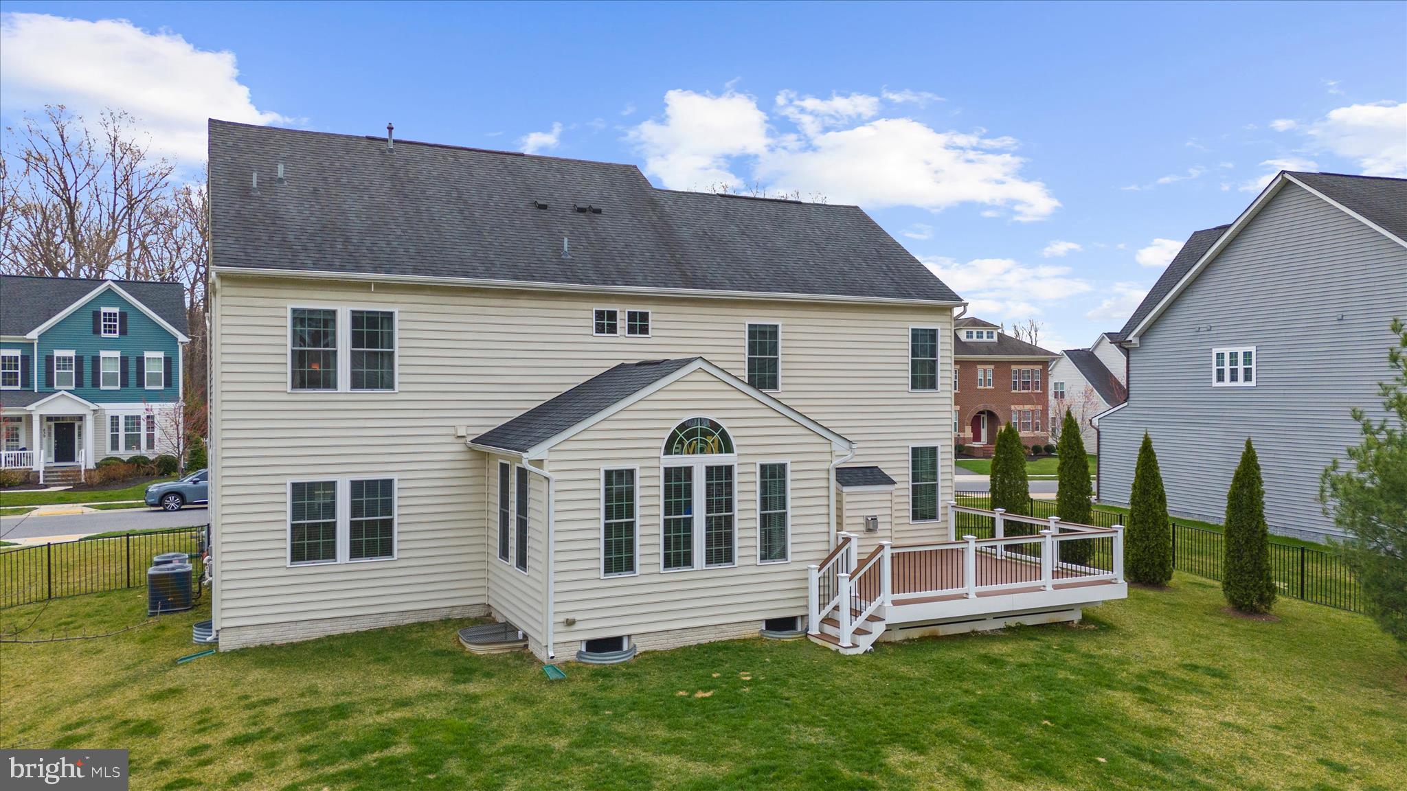 830 Sebastian Lane Gambrills, MD 21054 - Photo 51 of 63 a front view of a house with a yard