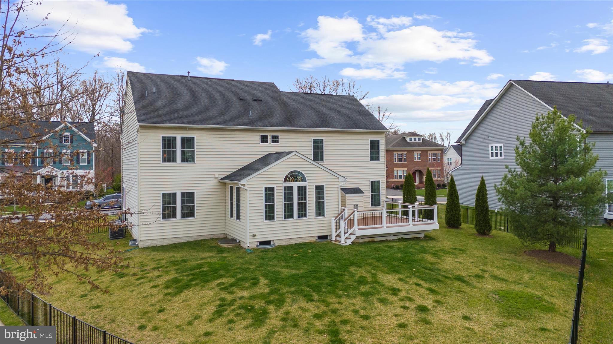830 Sebastian Lane Gambrills, MD 21054 - Photo 54 of 63 a front view of a house with a yard