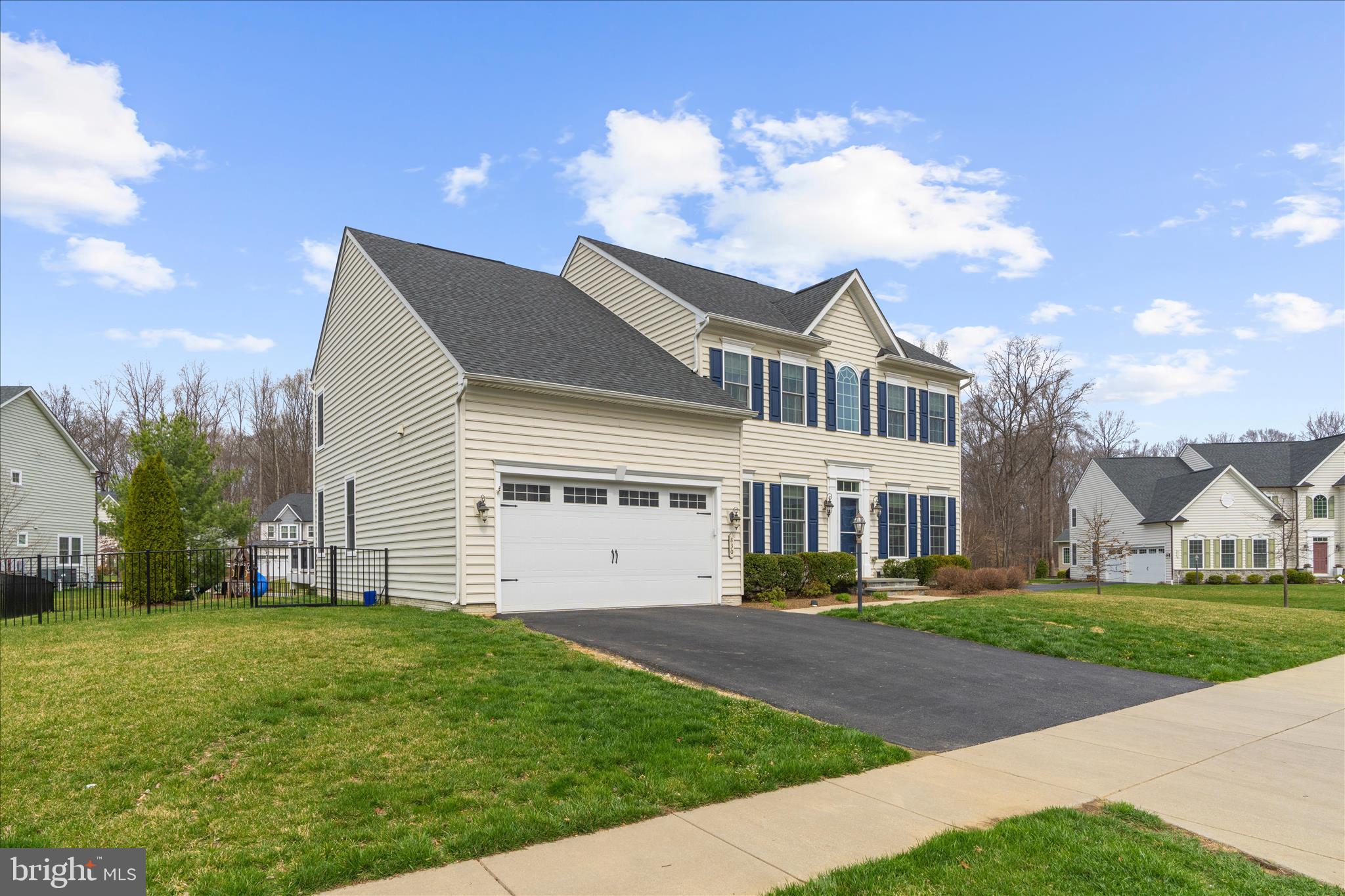 830 Sebastian Lane Gambrills, MD 21054 - Photo 59 of 63 a front view of a house with garden