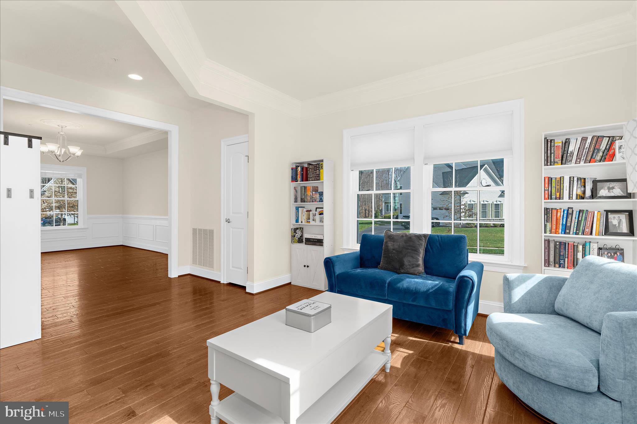 830 Sebastian Lane Gambrills, MD 21054 - Photo 6 of 63 a living room with furniture and a book shelf