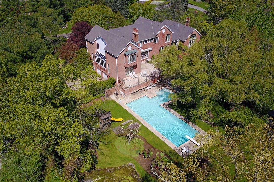 Aerial view of this majestic home in all of its splendor.