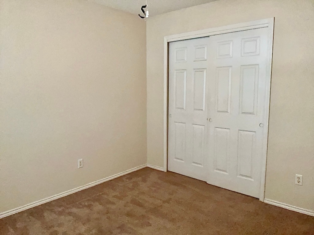 1313 Terra Street Round Rock, TX 78665 - Photo 17 of 25 an empty room with windows