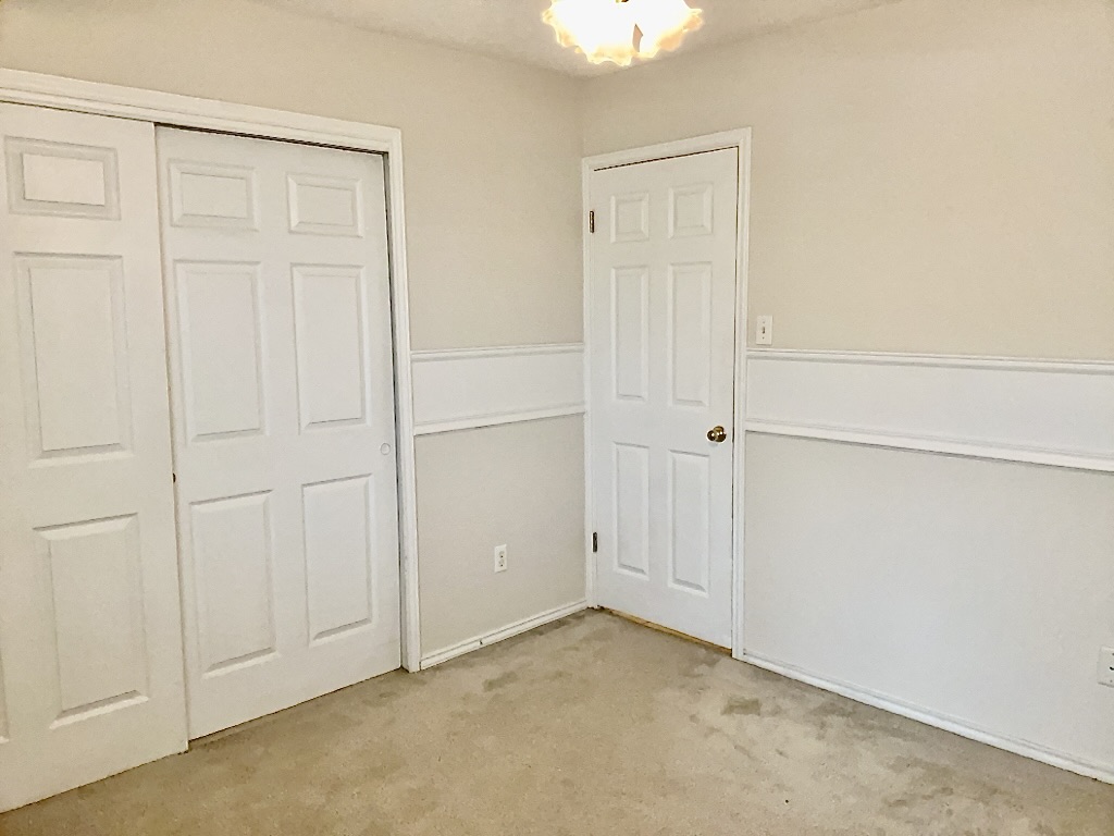 1313 Terra Street Round Rock, TX 78665 - Photo 21 of 25 an empty room with windows