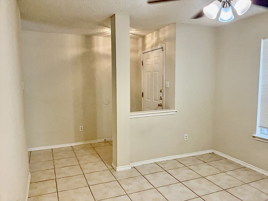 1313 Terra Street Round Rock, TX 78665 - Photo 4 of 25 a view of an empty room and window