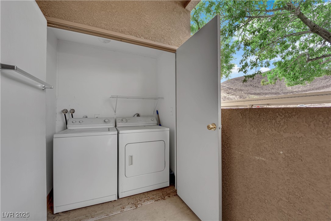 231 West Horizon Ridge Parkway, Unit 1313 Henderson, NV 89012 - Photo 15 of 20 Washroom featuring washer and clothes dryer