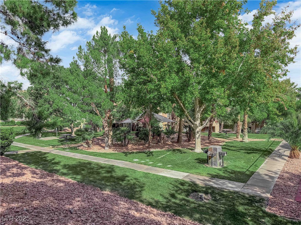 231 West Horizon Ridge Parkway, Unit 1313 Henderson, NV 89012 - Photo 16 of 20 View of property's community with a lawn