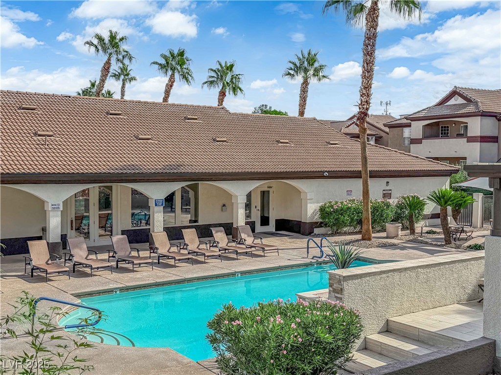 231 West Horizon Ridge Parkway, Unit 1313 Henderson, NV 89012 - Photo 17 of 20 Community pool with a patio area