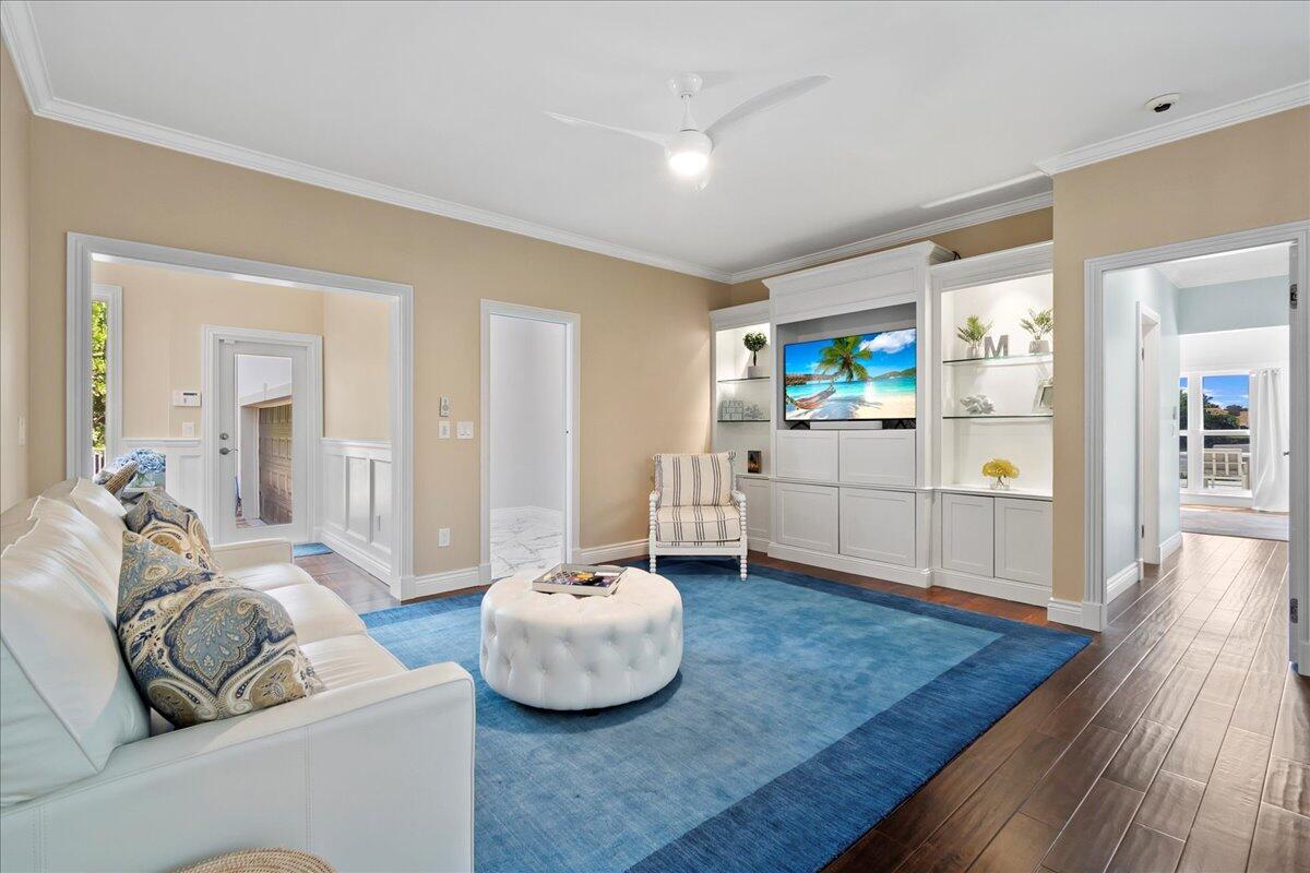 169 Apollo Circle Jupiter, FL 33477 - Photo 13 of 39 a living room with furniture and wooden floor