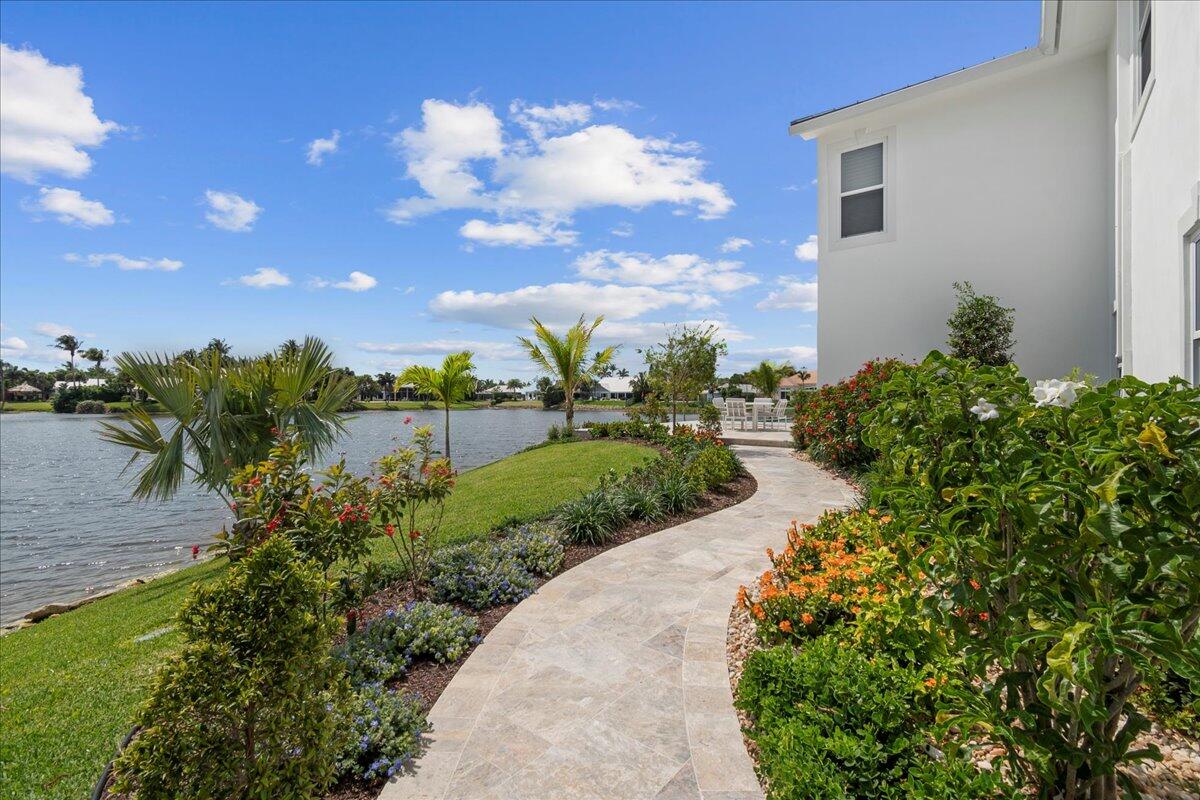 169 Apollo Circle Jupiter, FL 33477 - Photo 32 of 39 a view of a pathway with a yard