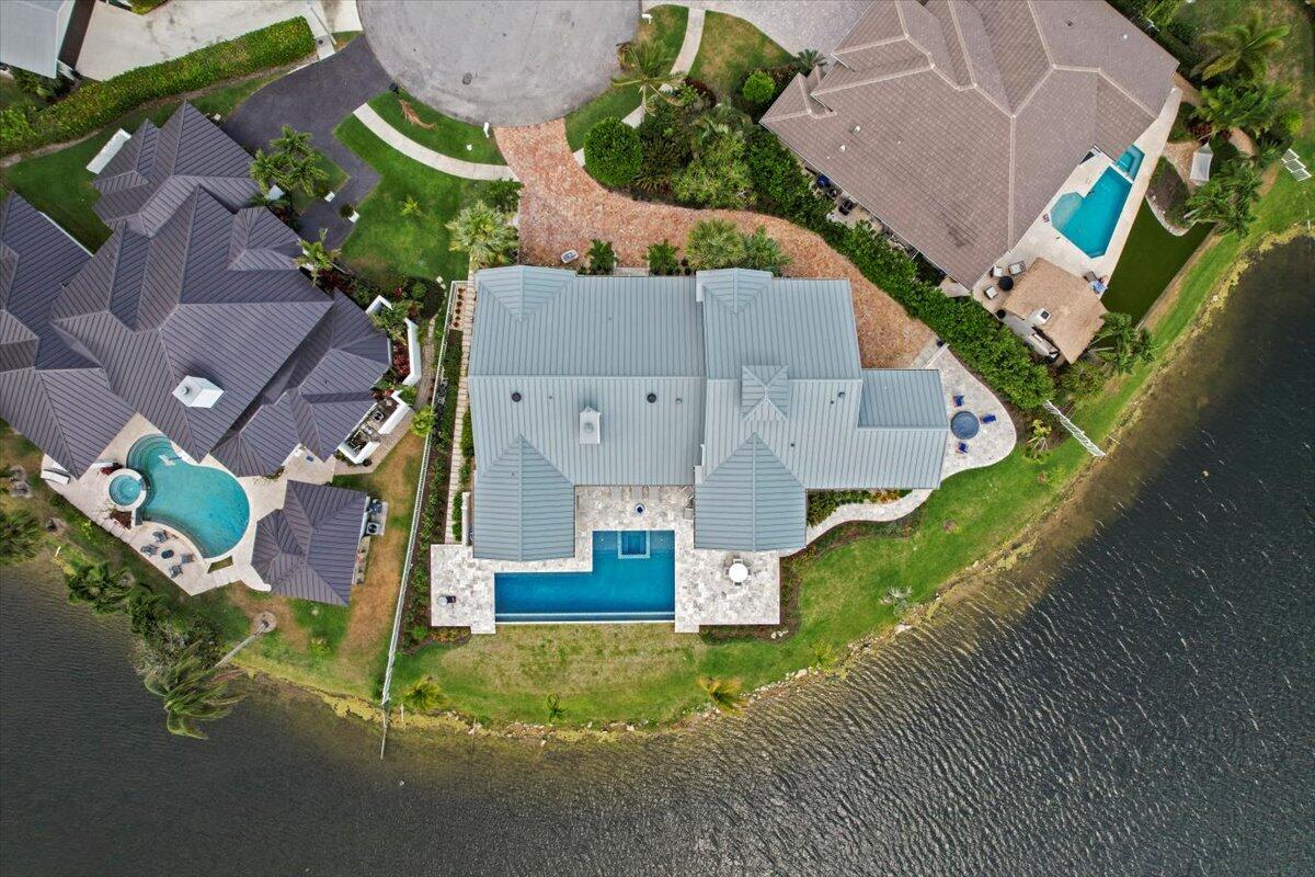 169 Apollo Circle Jupiter, FL 33477 - Photo 4 of 39 an aerial view of residential houses with outdoor space