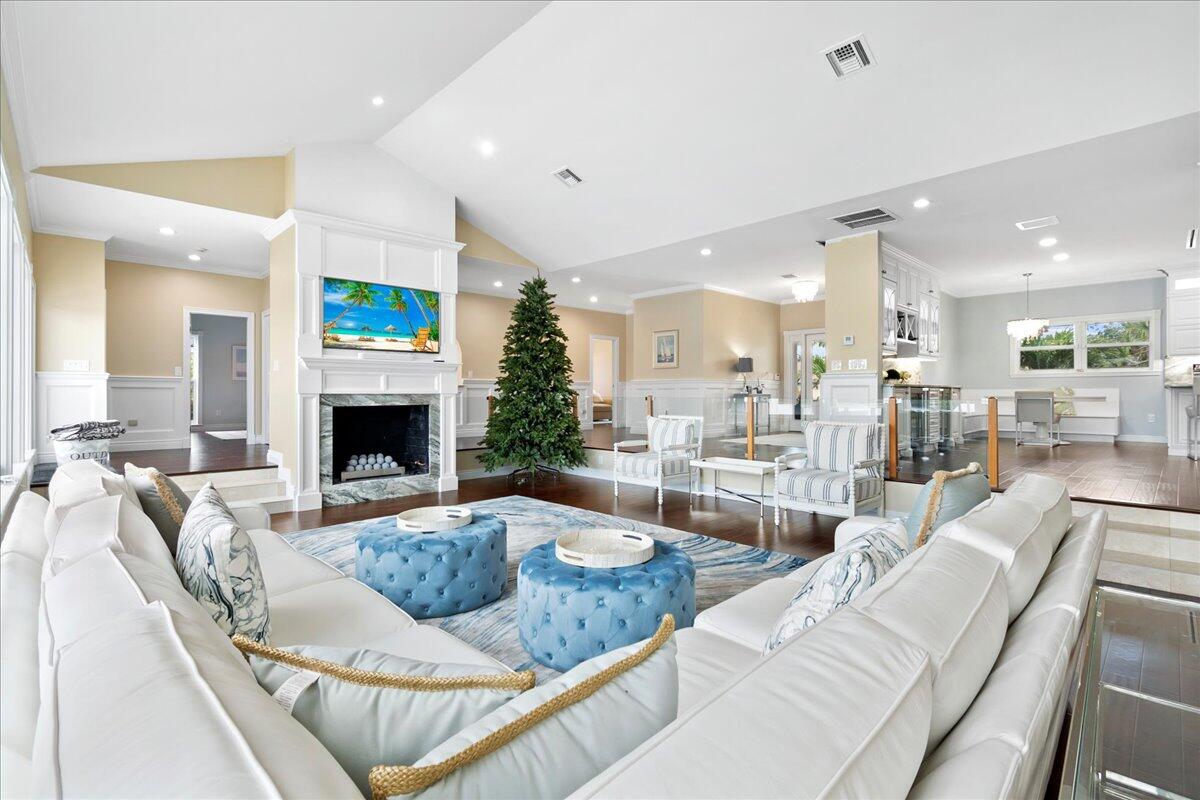 169 Apollo Circle Jupiter, FL 33477 - Photo 8 of 39 a living room with furniture and a fireplace