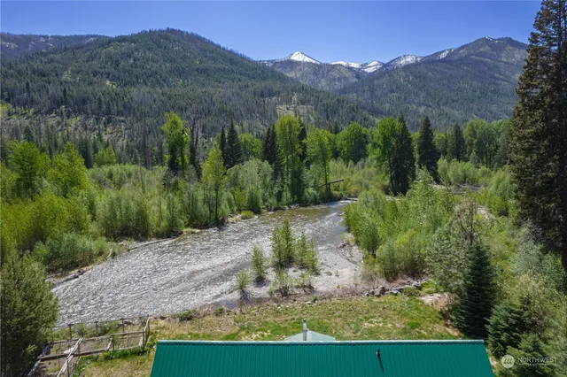 a garden view with a lake view