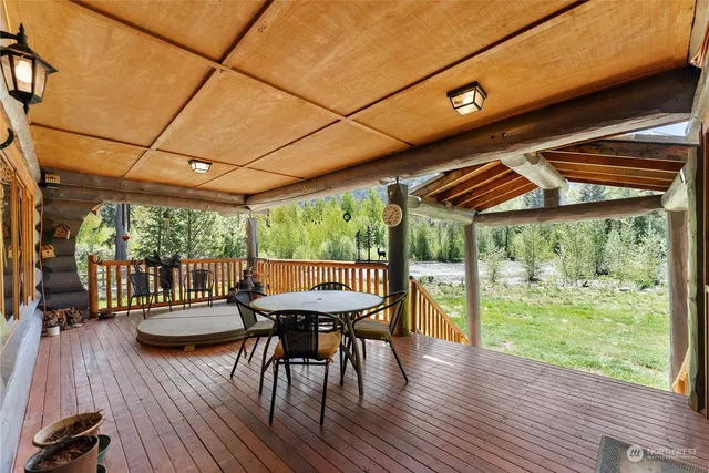 a view of a dining room with furniture window and outside view