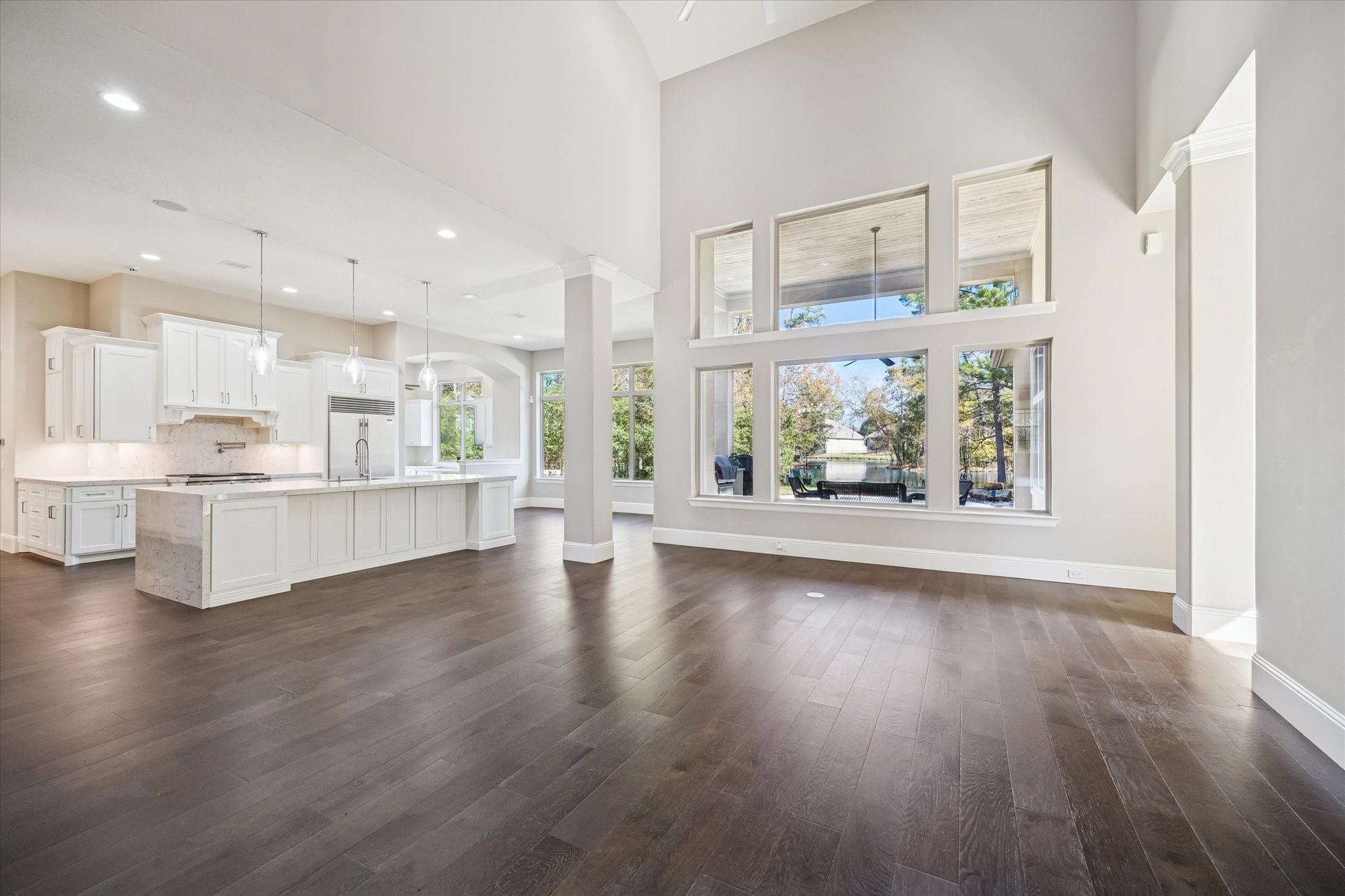 21018 Kings River Point Kingwood, TX 77346 - Photo 12 of 50 a view of kitchen with furniture and wooden floor