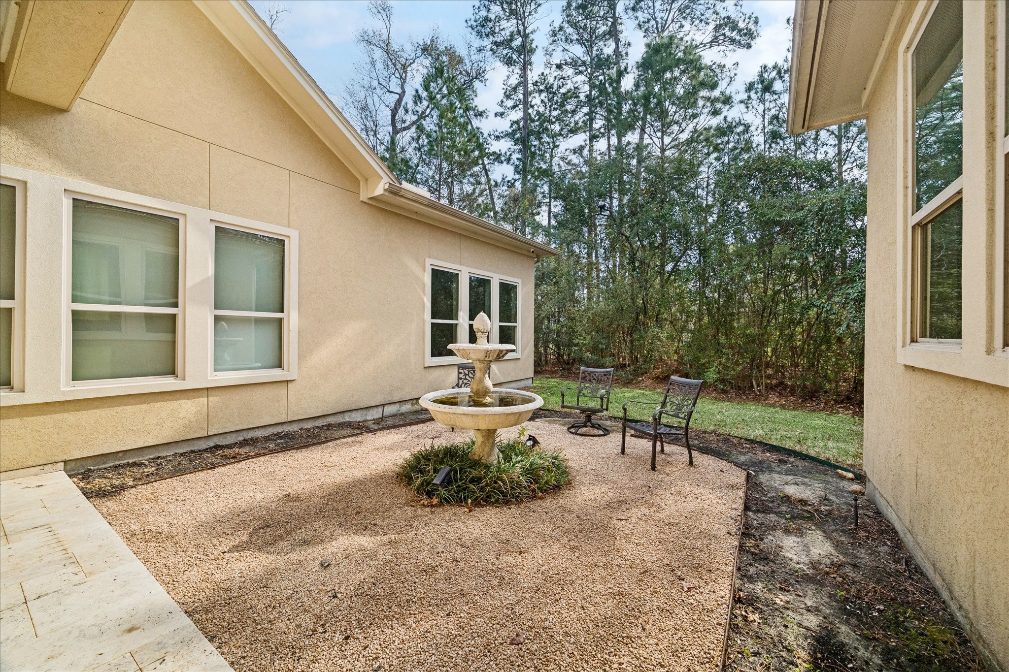 21018 Kings River Point Kingwood, TX 77346 - Photo 44 of 50 a front view of a house with garden