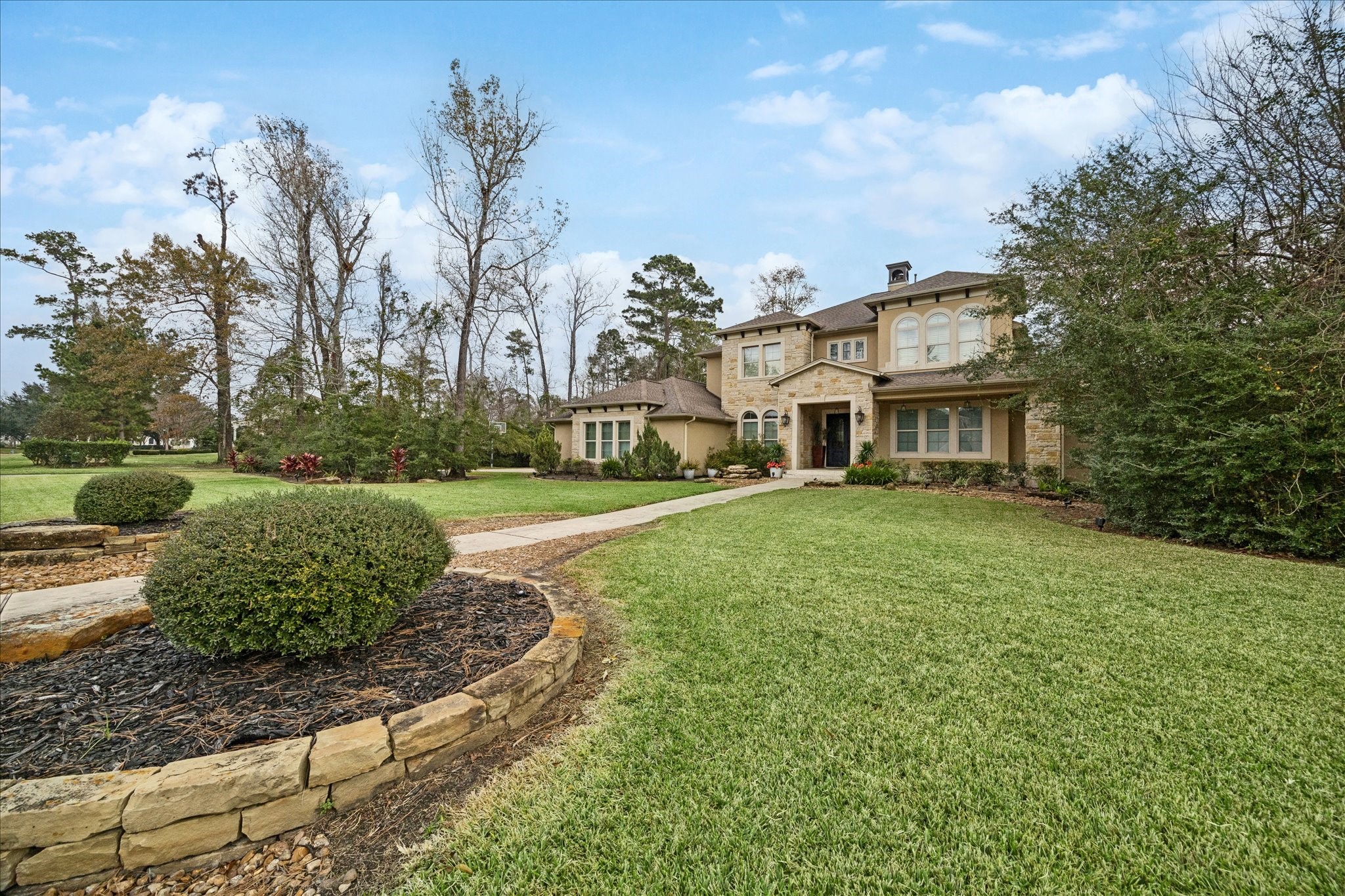 21018 Kings River Point Kingwood, TX 77346 - Photo 48 of 50 a view of a house with a yard