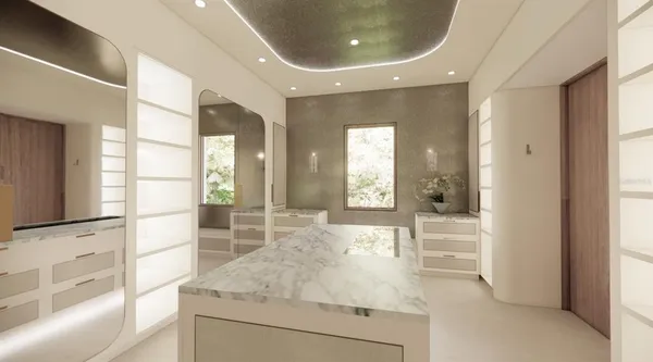 a bedroom with a large bed and a large window