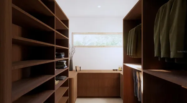 a bathroom with a tub shower and sink