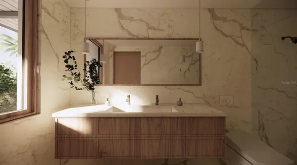 a view of an empty room with glass door