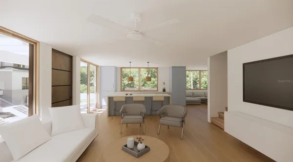 a view of a house with wooden floor and a ocean view