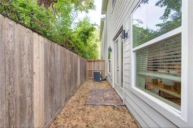 a view of a back yard of the house