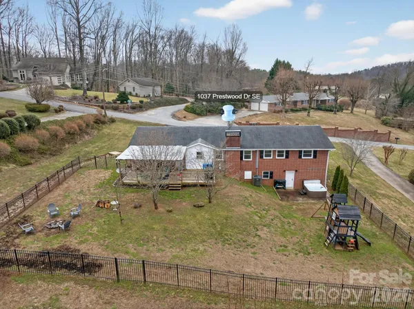 a view of a town with mountains