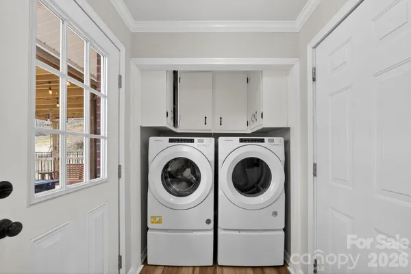 a utility room with dryer and washer
