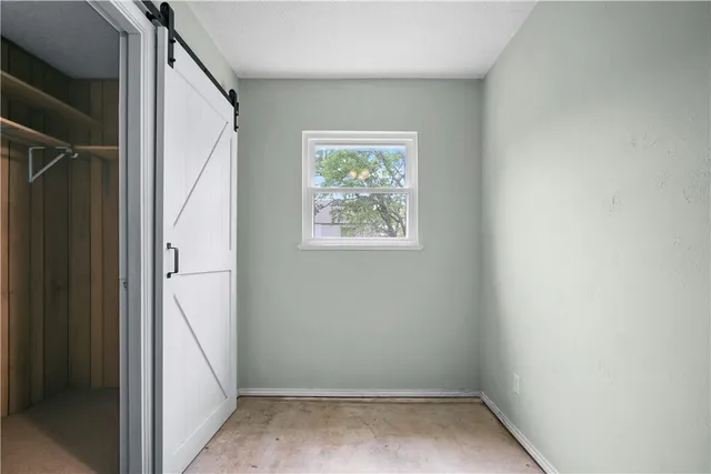 an empty room with windows