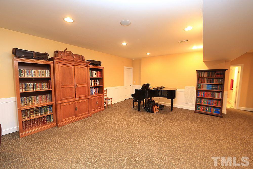 6844 Pond Road Wendell, NC 27591 - Photo 15 of 25 a view of livingroom with furniture and natural light