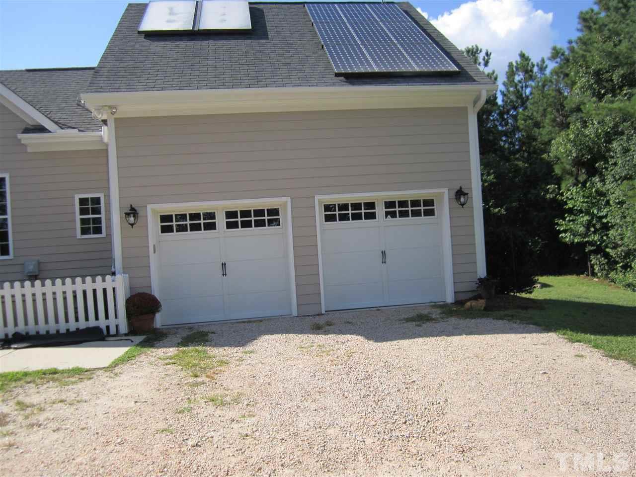 6844 Pond Road Wendell, NC 27591 - Photo 24 of 25 a backyard of a house