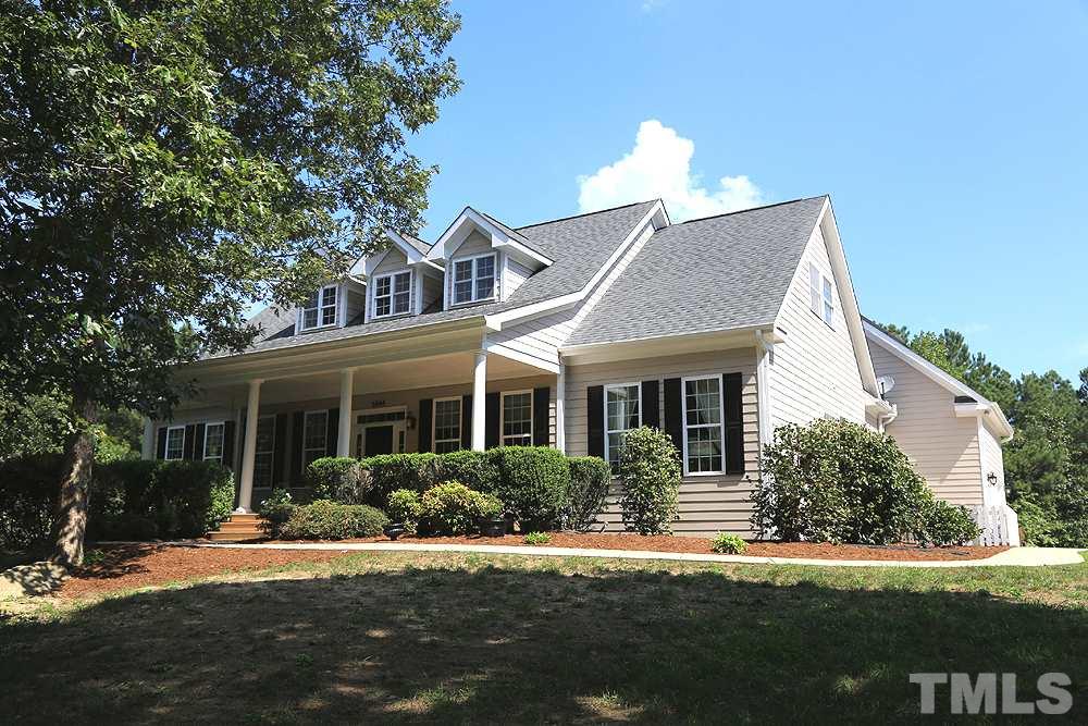6844 Pond Road Wendell, NC 27591 - Photo 25 of 25 a view of a house with a yard