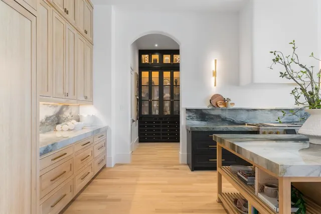 a kitchen with stainless steel appliances granite countertop a stove and a cabinets