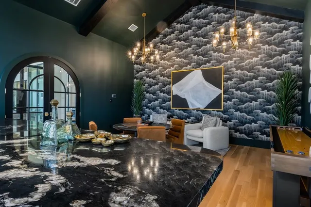 a living room with furniture and a rug