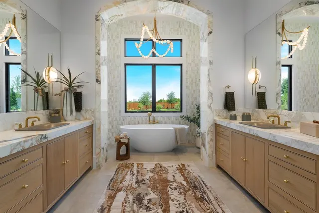 a spacious bathroom with a sink a large mirror and a bathtub