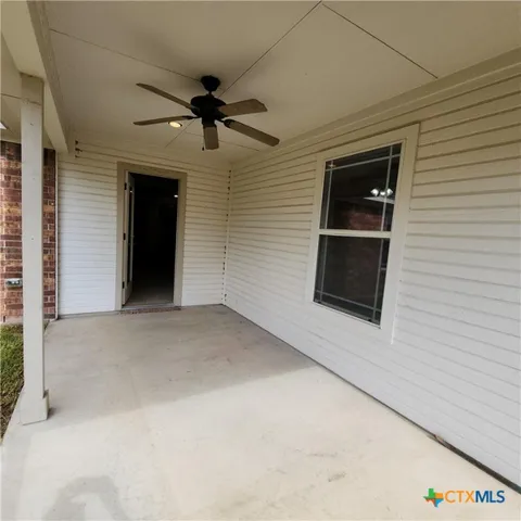 a living room with a fireplace and a table