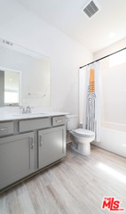 587 Daniel Freeman Circle Inglewood, CA 90301 - Photo 19 of 25 a bathroom with a sink and a toilet