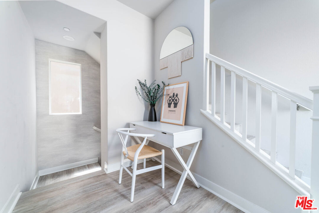 587 Daniel Freeman Circle Inglewood, CA 90301 - Photo 8 of 25 a dining room with furniture and wooden floor