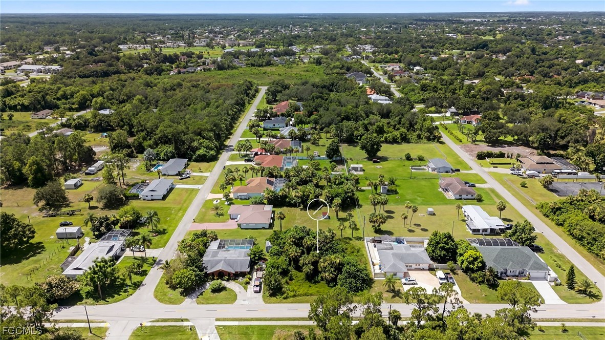 1904 East 6th Street Lehigh Acres, FL 33936 - Photo 3 of 11 an aerial view of residential houses with outdoor space