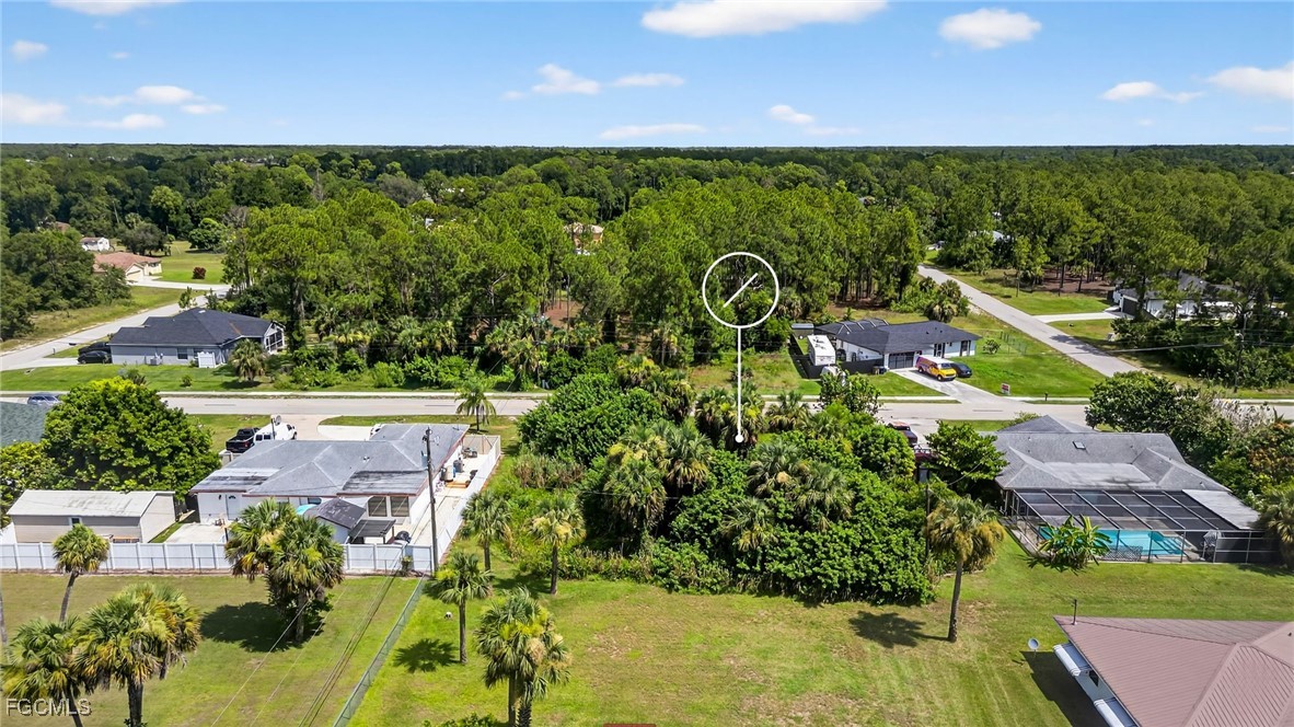 1904 East 6th Street Lehigh Acres, FL 33936 - Photo 8 of 11 a view of a garden with an outdoor space