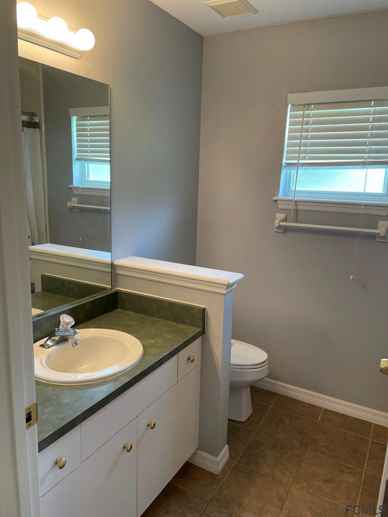 1310 Broken Pine Road Deltona, FL 32725 - Photo 8 of 18 Hall Bath