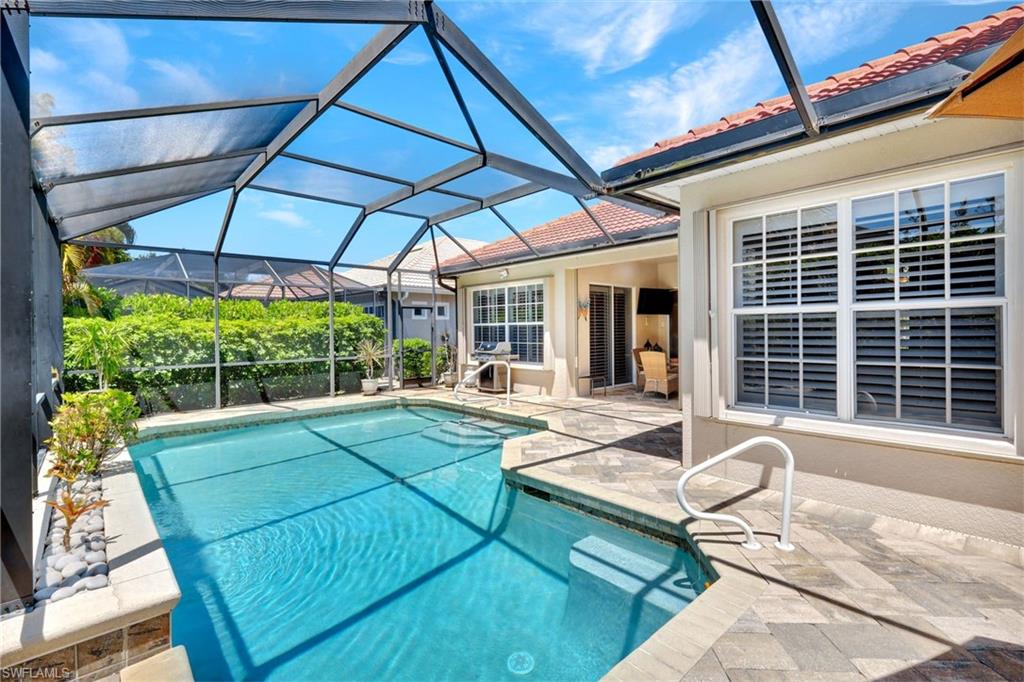 16208 Parque Lane Naples, FL 34110 - Photo 22 of 22 a house view with a sitting space