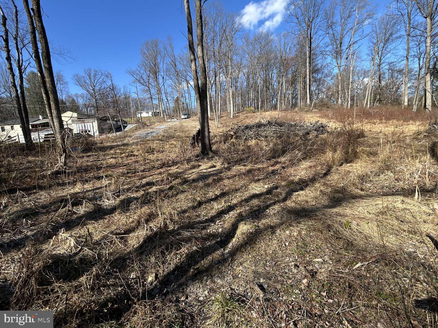 1404 Airport Road Coatesville, PA 19320 - Photo 11 of 12 a view of a yard covered with snow in the background
