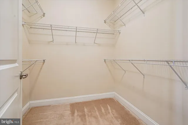 a view of a room with racks on the wall